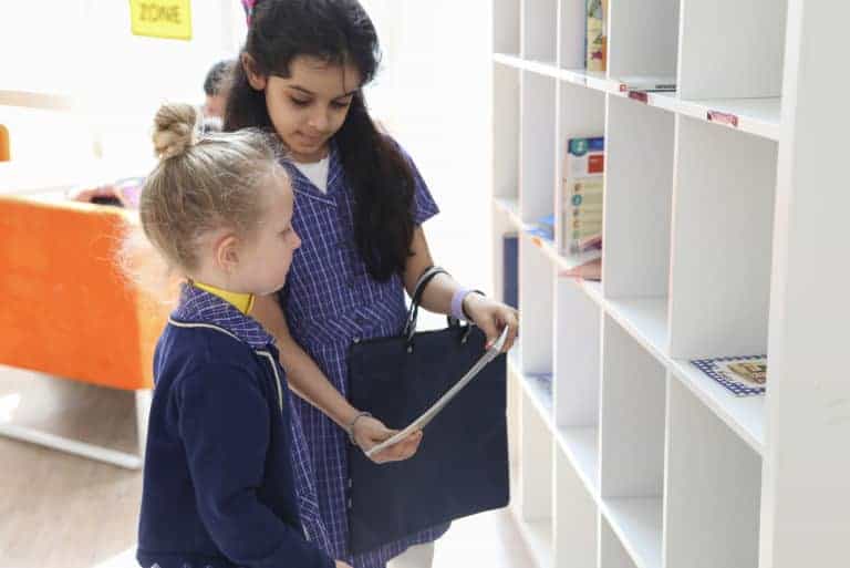 Students Sharing Book